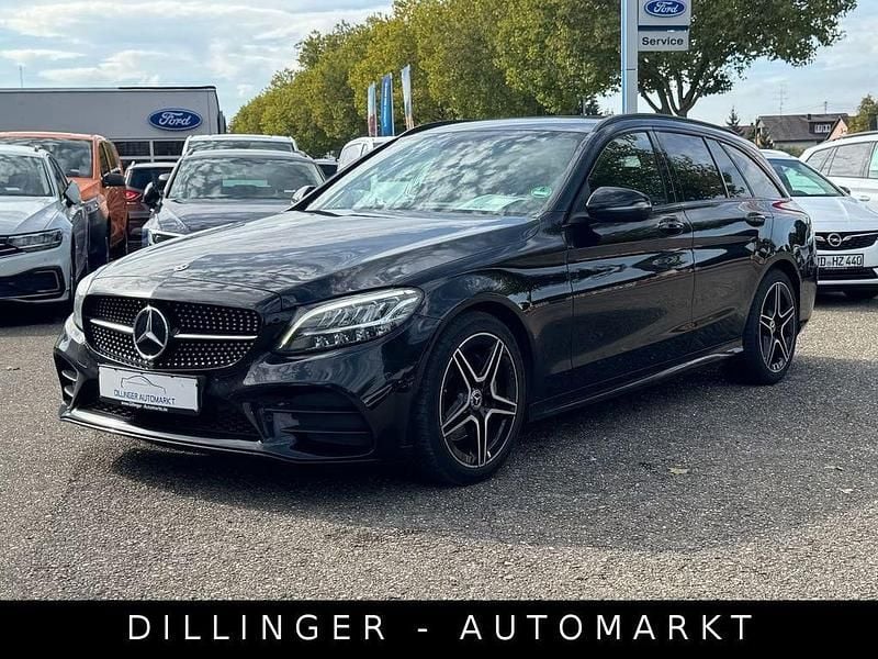 Schwarz Gebraucht 2018 Mercedes C220 AMG line Limousine | 21.870 € (Fairer Preis) - Bild 1/4
