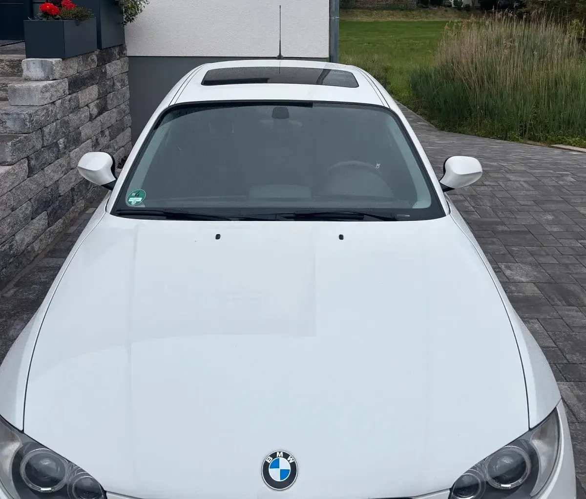 Używany BMW 116 122 KM (89 kW) 2011 Biały Hatchback