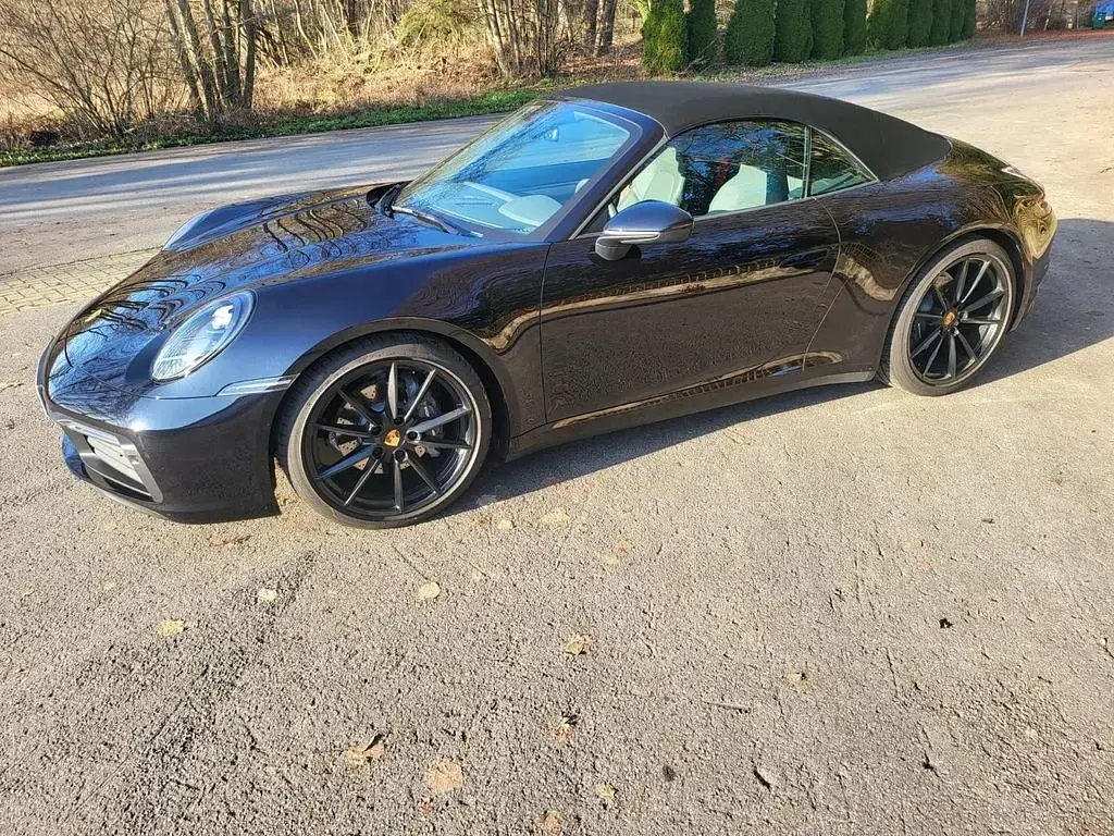 Gebraucht Porsche 992 385 PS (283 kW) 2023 Schwarz Cabrio