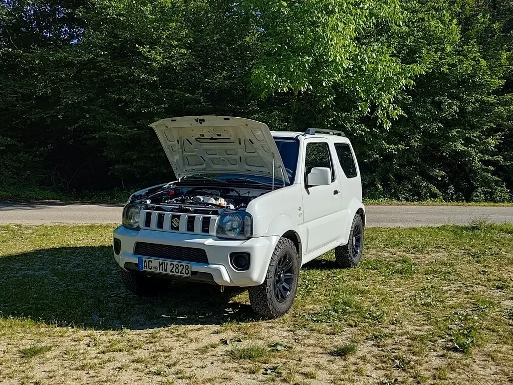 Gebraucht Suzuki Jimny Comfort 84 PS (61 kW) 2016 Weiß SUV