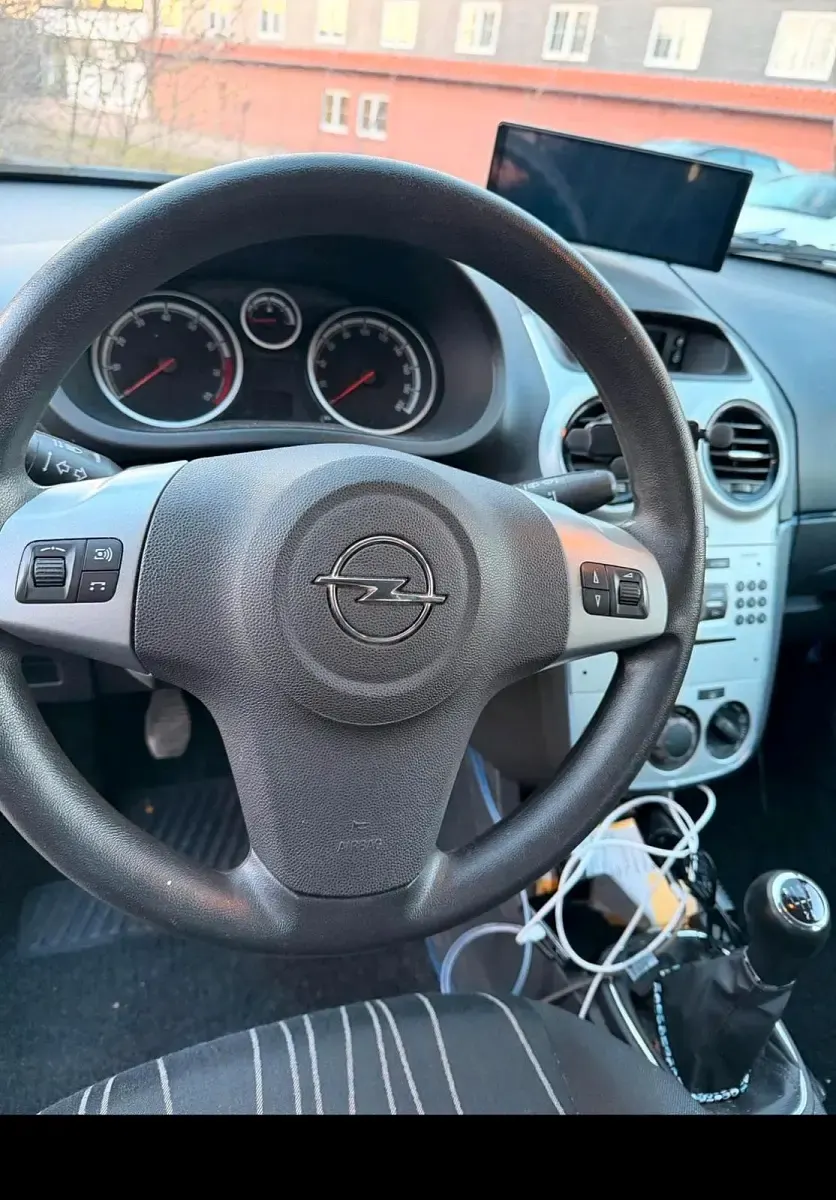 Używany Opel Corsa 60 KM (44 kW) 2010 Niebieski Hatchback