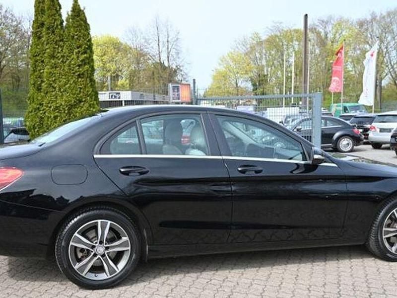Second-hand Mercedes C180 156 CP (114 kW) 2014 Negru Berlinǎ