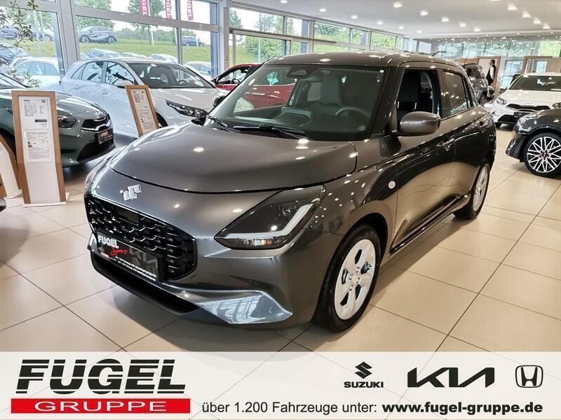 Mineral gray Neu 2024 Suzuki Swift Comfort Kleinwagen | 17.999 € - Bild 1/4