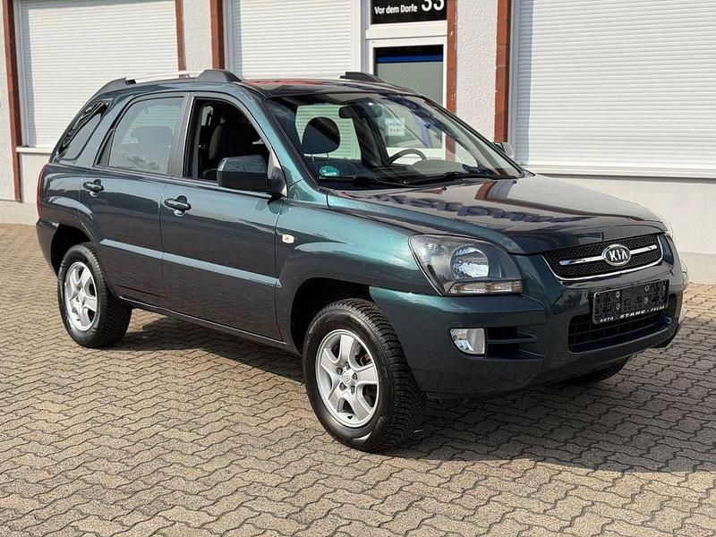 Grün Gebraucht 2008 Kia Sportage SUV | 4.900 € (Fairer Preis) - Bild 1/4