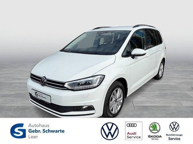 Weiß Gebraucht 2024 VW Touran Comfortline Van / Kleinbus | 32.880 € (Fairer Preis) - Bild 1/4