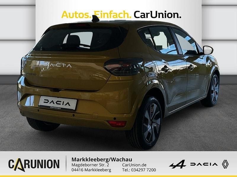 Neu Dacia Sandero Expression 101 PS (74 kW) 2026 Amber yellow Limousine