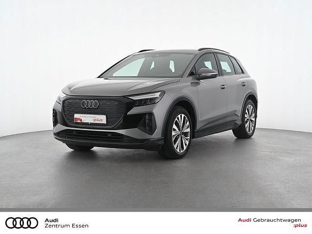 Taifungrau metallic Gebraucht 2022 Audi Q4 e-tron Ambiente SUV | 30.880 € (Guter Preis) - Bild 1/3
