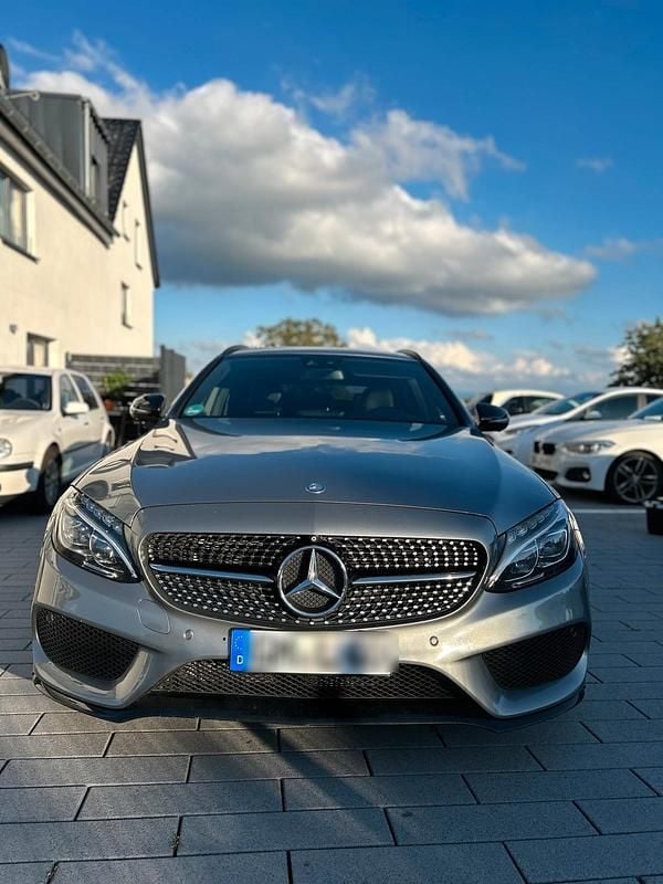 Grau Gebraucht 2015 Mercedes C450 AMG Kombi | 20.600 € (Fairer Preis) - Bild 1/4