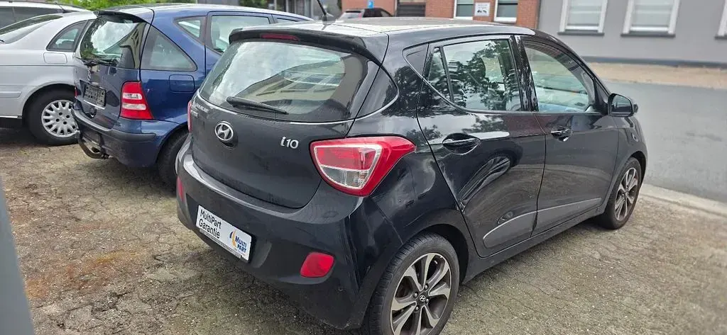 Gebraucht Hyundai i10 Style 67 PS (49 kW) 2014 Schwarz Kleinwagen