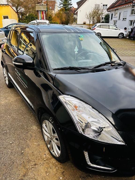 Gebraucht Suzuki Swift 94 PS (69 kW) 2015 Schwarz Kleinwagen