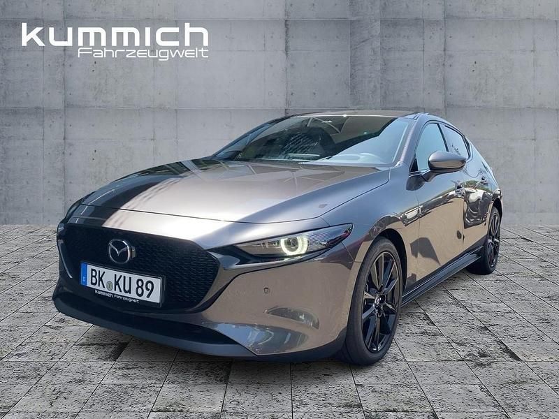 Machine gray (grau) Gebraucht 2024 Mazda 3 Exclusive-Line Kleinwagen | 30.989 € (Fairer Preis) - Bild 1/4