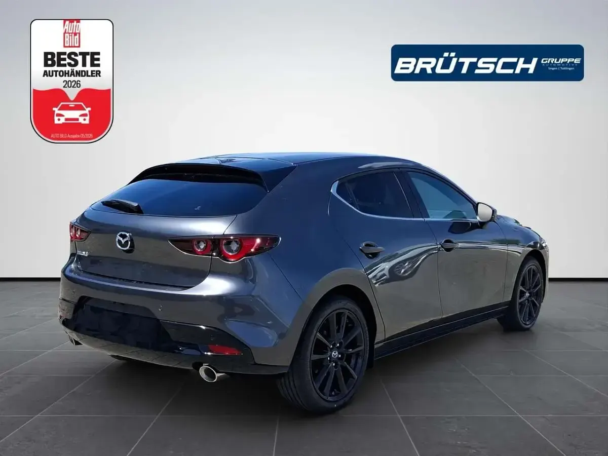 Neu Mazda 3 Exclusive-Line 186 PS (136 kW) 2026 Machine gray metallic Limousine