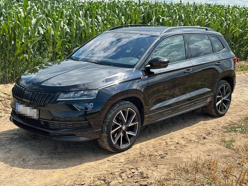 Schwarz Gebraucht 2021 Skoda Karoq SportLine SUV | 31.000 € (Etwas zu teuer) - Bild 1/4
