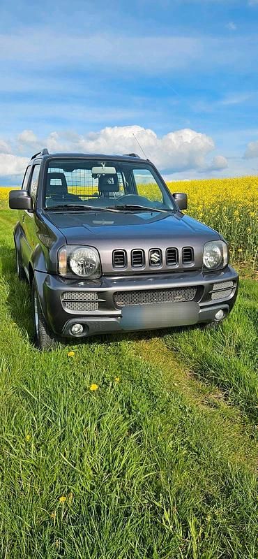 Second-hand Suzuki Jimny Style 86 CP (63 kW) 2011 Gri SUV