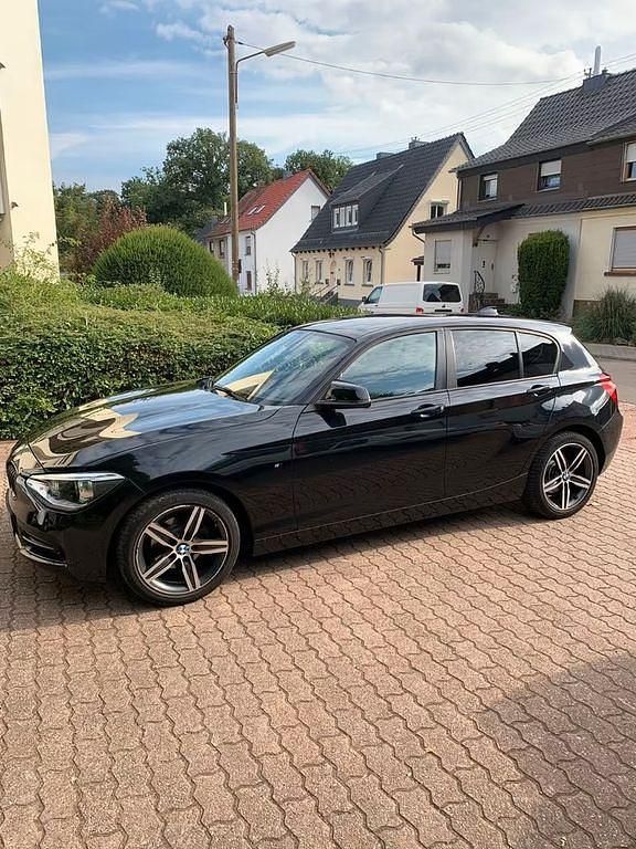 Schwarz Gebraucht 2011 BMW 116 Sport Line Kleinwagen | 8.999 € (Etwas zu teuer) - Bild 1/4