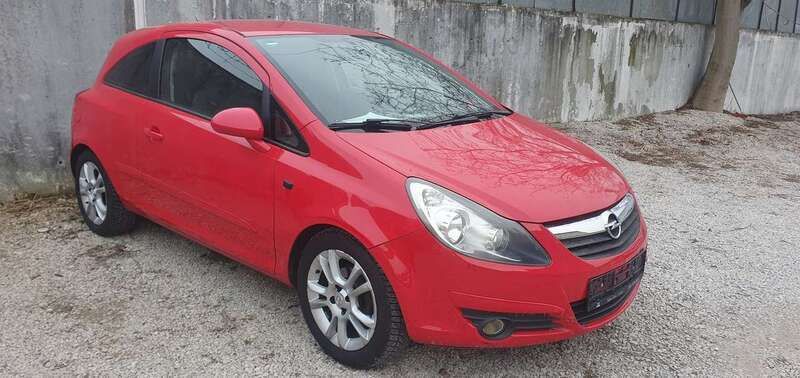 Magma rot (b) Gebraucht 2007 Opel Corsa Sport Kleinwagen | 1.999 € (Teuer) - Bild 1/4