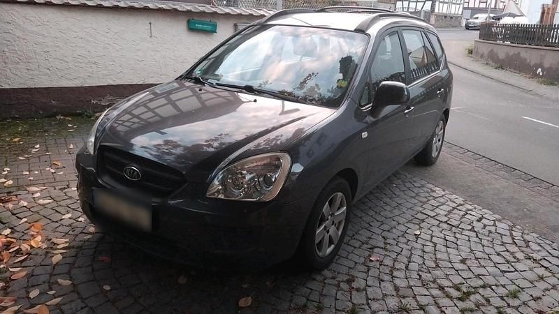 Grau Gebraucht 2009 Kia Carens Van / Kleinbus | 2.950 € (Guter Preis) - Bild 1/4