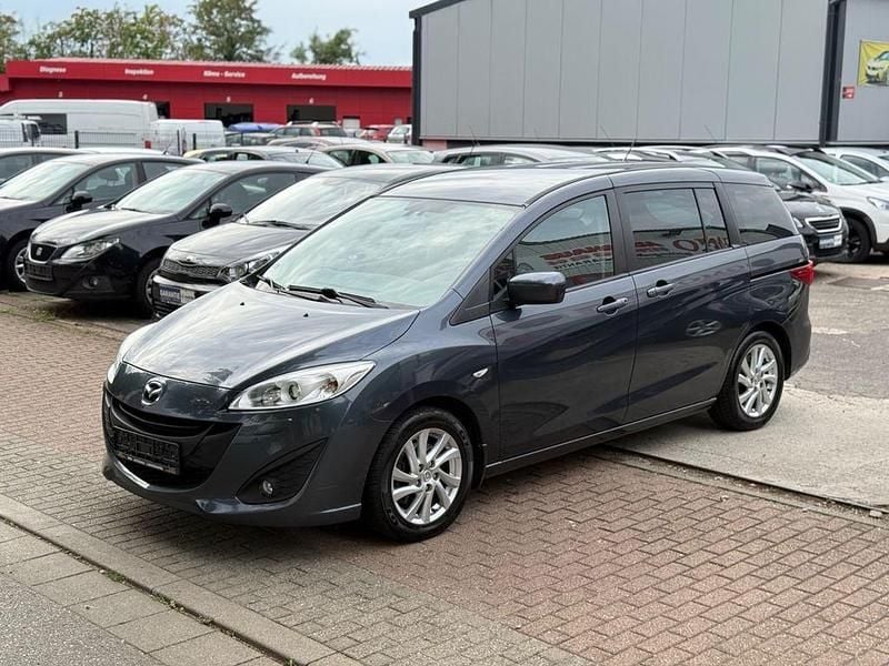 Grau Gebraucht 2011 Mazda 5 Center-Line Van / Kleinbus | 6.990 € (Teuer) - Bild 1/4