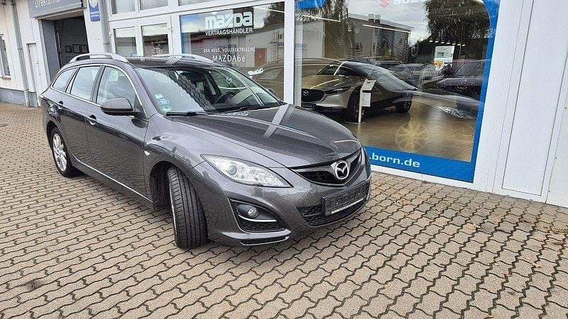 Tritongrau metallic Gebraucht 2012 Mazda 6 Edition Kombi | 5.790 € - Bild 1/4