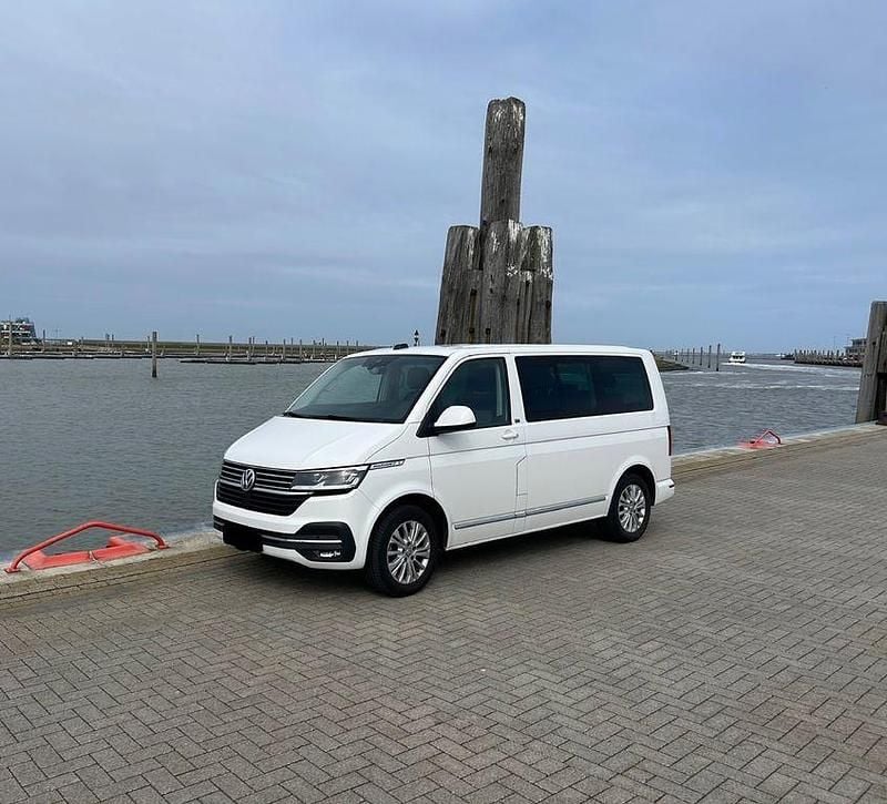 Second-hand VW Multivan Generation Six 150 CP (110 kW) 2020 Alb Monovolum