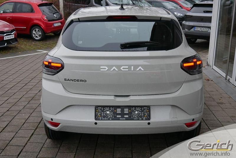 Neu Dacia Sandero Expression 101 PS (74 kW) 2026 Beige Limousine