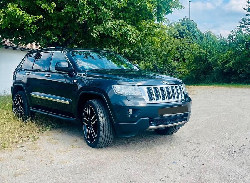 Grau Gebraucht 2011 Jeep Grand Cherokee Overland SUV | 16.000 € - Bild 1/4