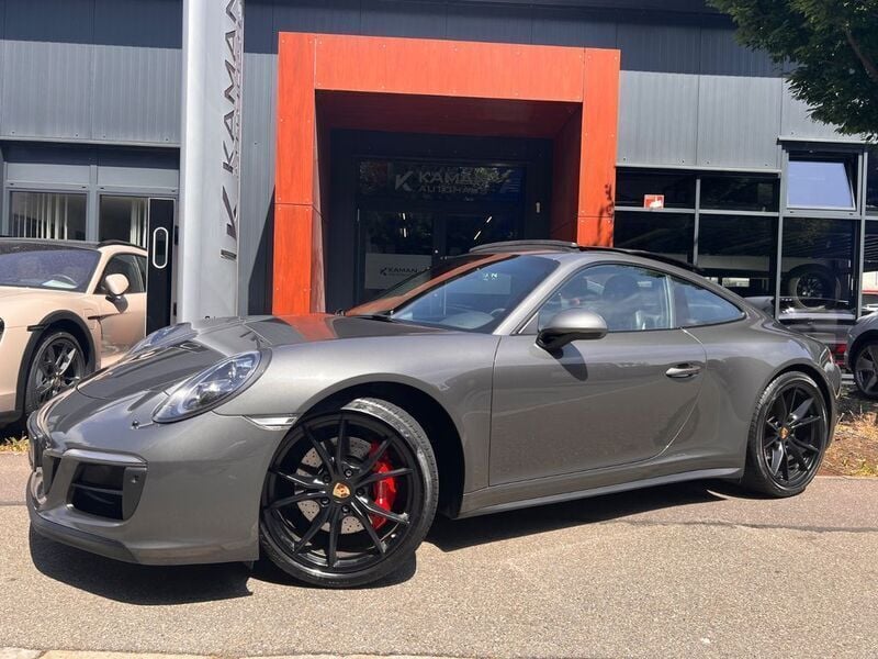 Grau Gebraucht 2018 Porsche 911 Carrera 4 GTS Coupé | 99.500 € - Bild 1/4