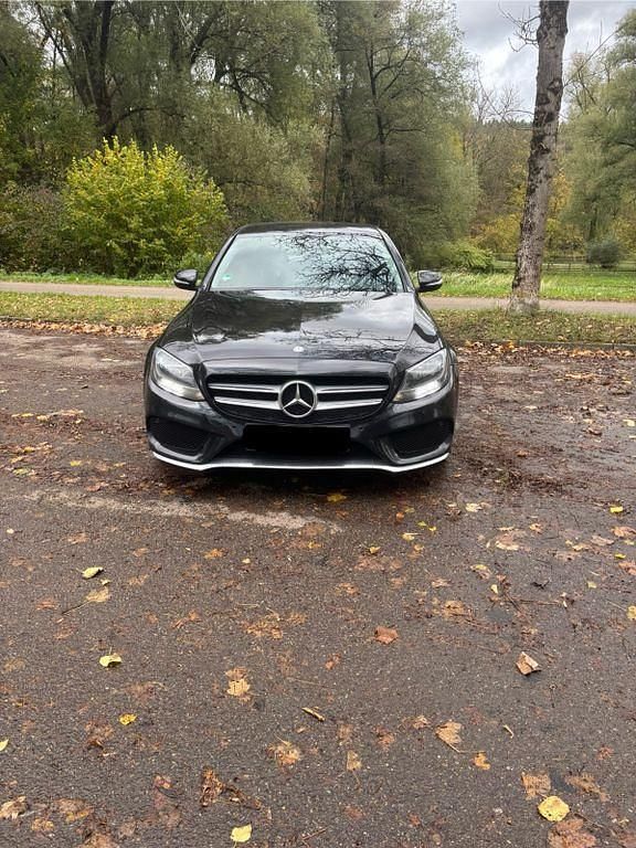 Schwarz Gebraucht 2015 Mercedes C200 AMG line Limousine | 18.500 € (Fairer Preis) - Bild 1/4
