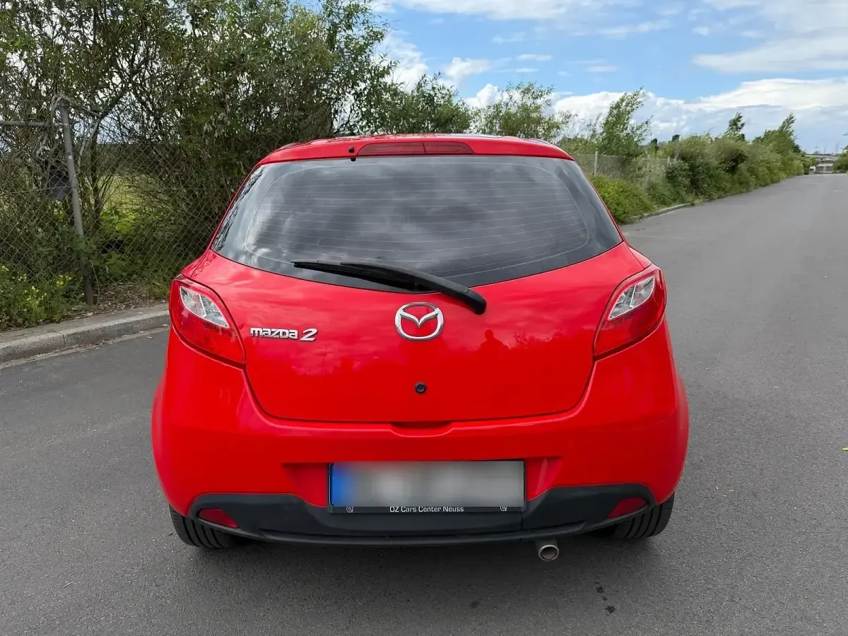 Gebraucht Mazda 2 68 PS (50 kW) 2009 Rot Kleinwagen