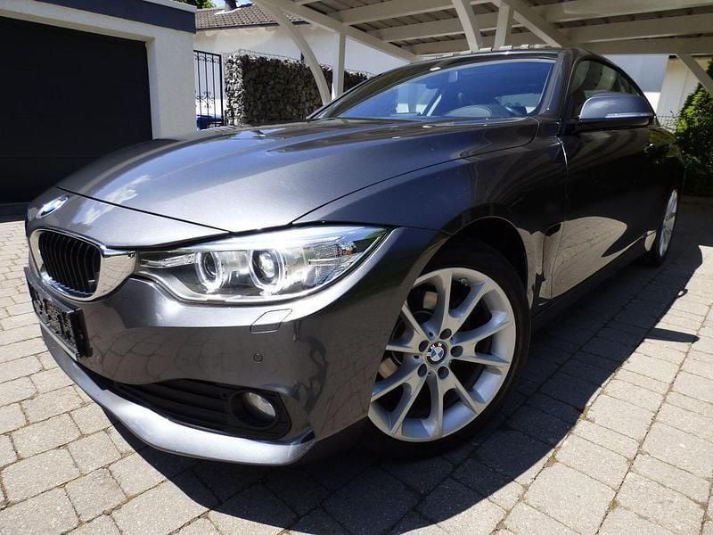 Grau Gebraucht 2016 BMW 418 Performance Coupé | 14.990 € - Bild 1/4