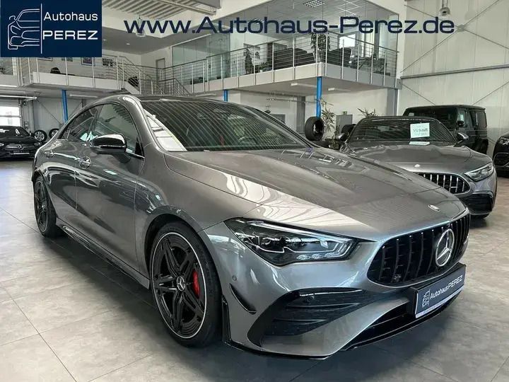 Grau Gebraucht 2024 Mercedes CLA35 AMG Premium Plus Coupé | 52.749 € (Guter Preis) - Bild 1/4