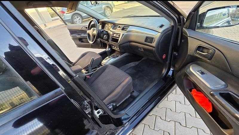 Gebraucht Mitsubishi Lancer Invite 98 PS (72 kW) 2006 Schwarz Kombi