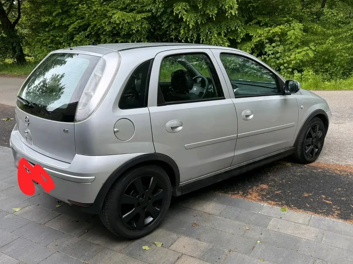 Używany Opel Corsa 75 KM (55 kW) 2006 Szary Hatchback