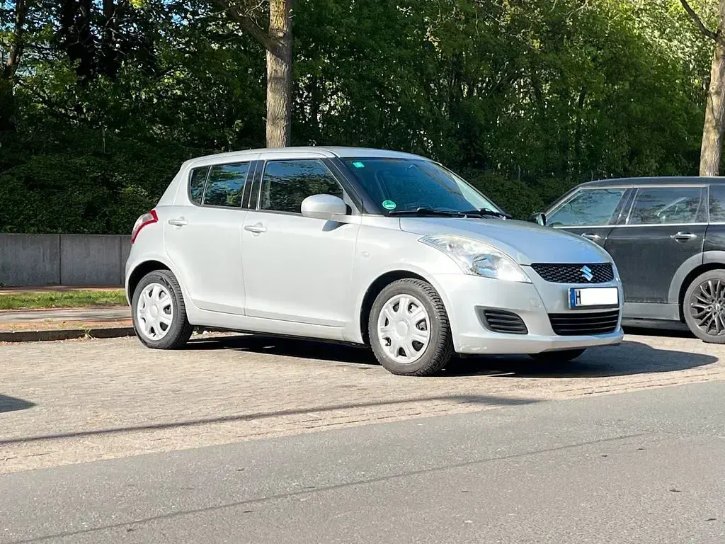 Second-hand Suzuki Swift 94 CP (69 kW) 2013 Gri Hatchback