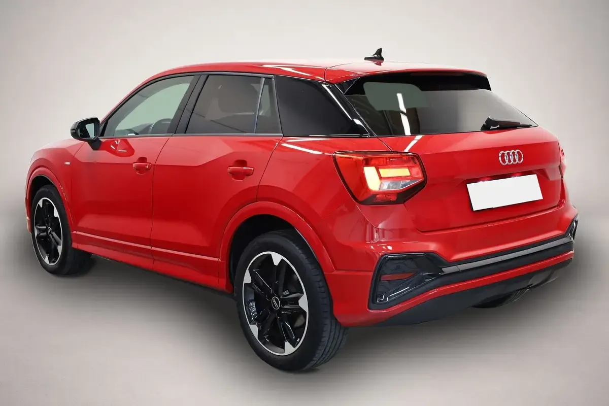 Gebraucht Audi Q2 S-Line 110 PS (80 kW) 2022 Tangorot metallic SUV