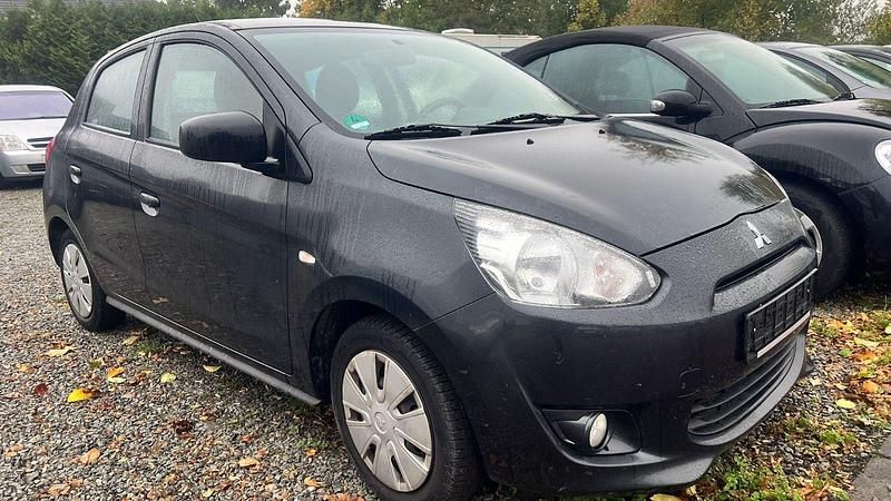 Grau Gebraucht 2015 Mitsubishi Space Star Classic Collection Kleinwagen | 4.990 € (Fairer Preis) - Bild 1/4