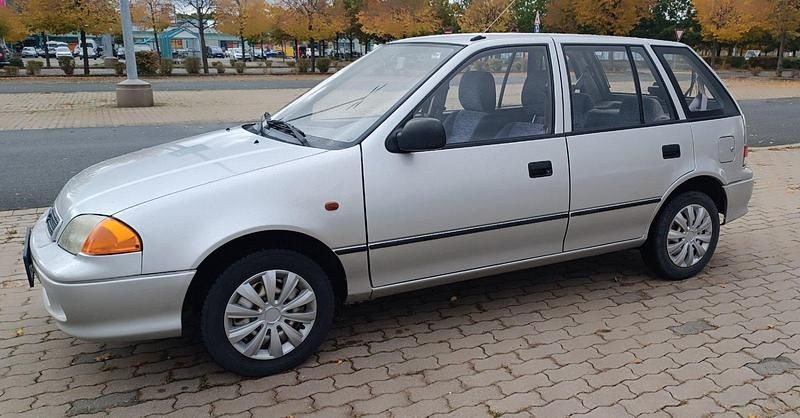 Silber Gebraucht 2001 Suzuki Swift Kleinwagen | 1.899 € - Bild 1/4