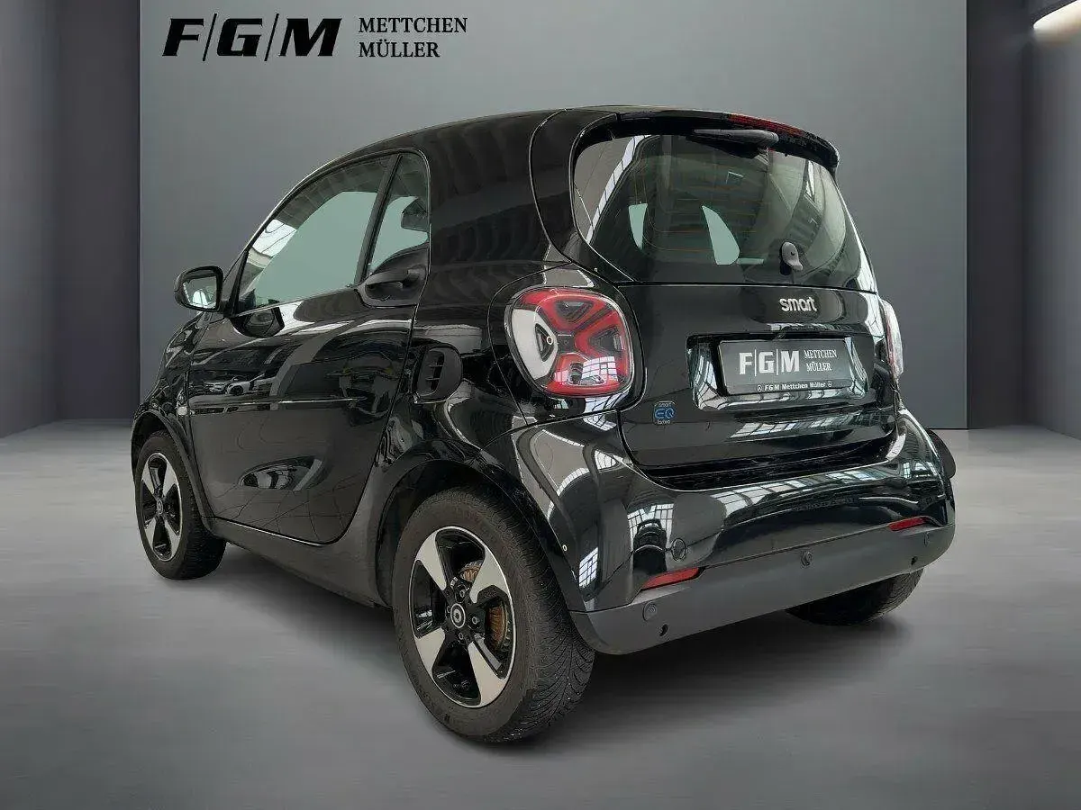 Gebraucht Smart ForTwo Coupé 60 kW (82 PS) 2023 Bodypanels in black Kleinwagen