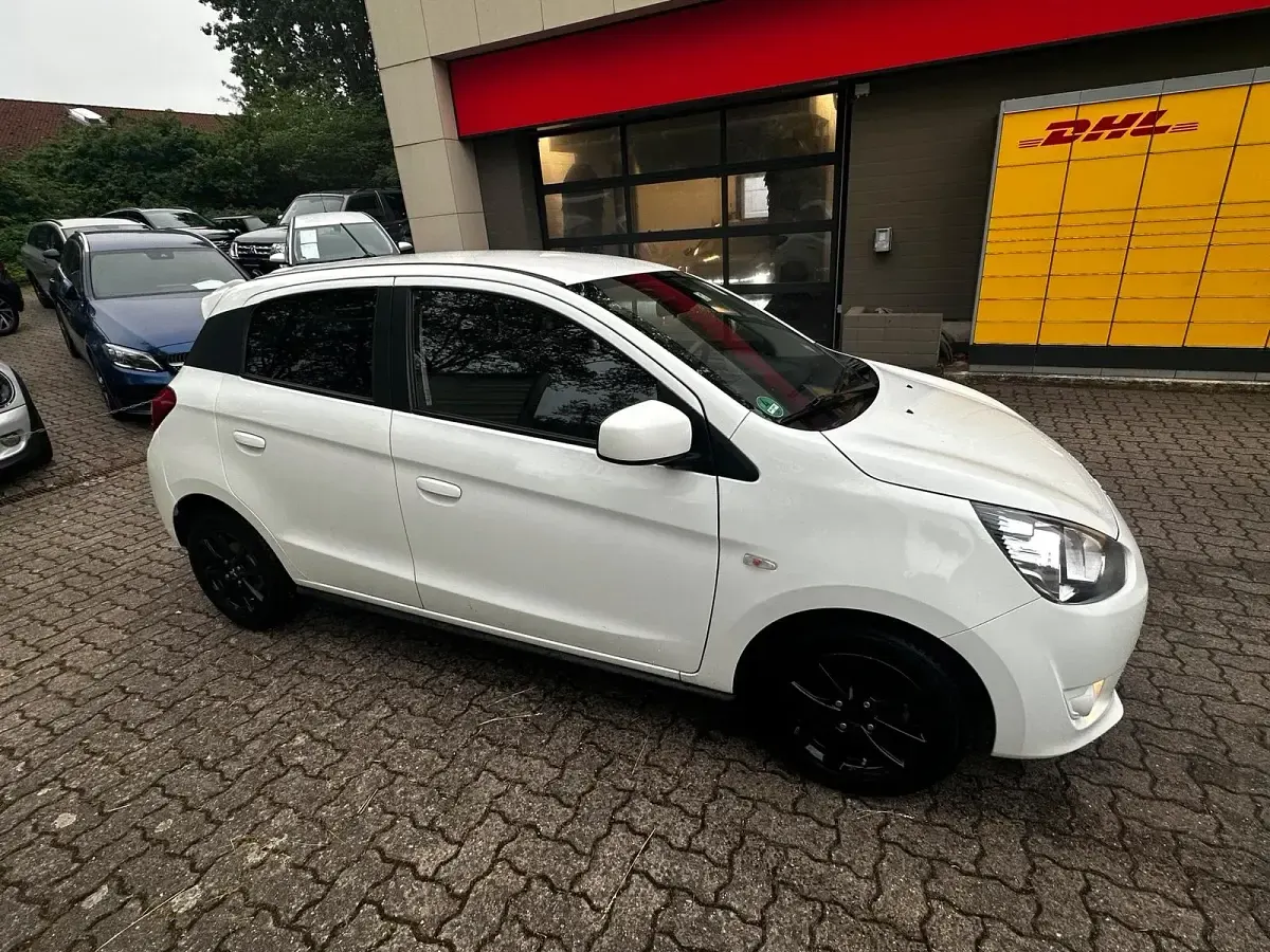 Begagnad Mitsubishi Space Star 80 HK (58 kW) 2016 Vit Halvkombi
