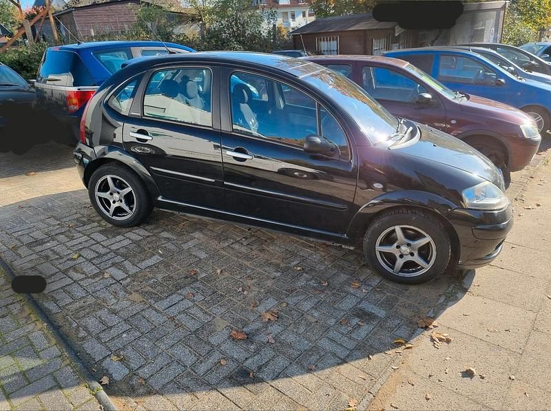 Second-hand Citroën C3 Exclusive 73 CP (53 kW) 2003 Negru Hatchback