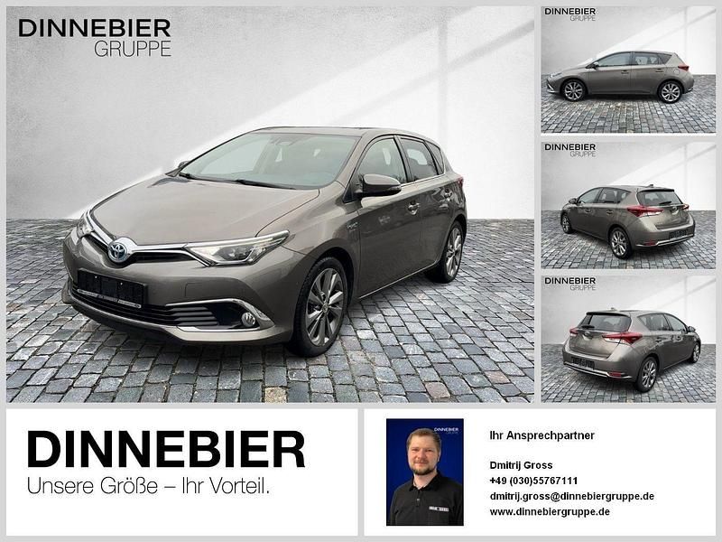 Gray metallic Gebraucht 2017 Toyota Auris Hybrid Executive Limousine | 16.490 € (Fairer Preis) - Bild 1/2