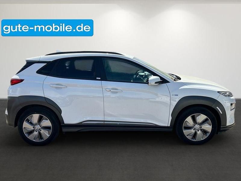 Gebraucht Hyundai Kona Premium 150 kW (204 PS) 2021 Polar white / sol SUV