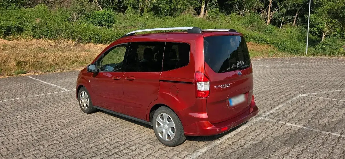 Gebraucht Ford Tourneo Courier 100 PS (73 kW) 2018 Orange Van / Kleinbus