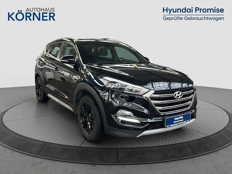 Phantom black Gebraucht 2018 Hyundai Tucson Passion Plus SUV | 16.900 € (Fairer Preis) - Bild 1/4