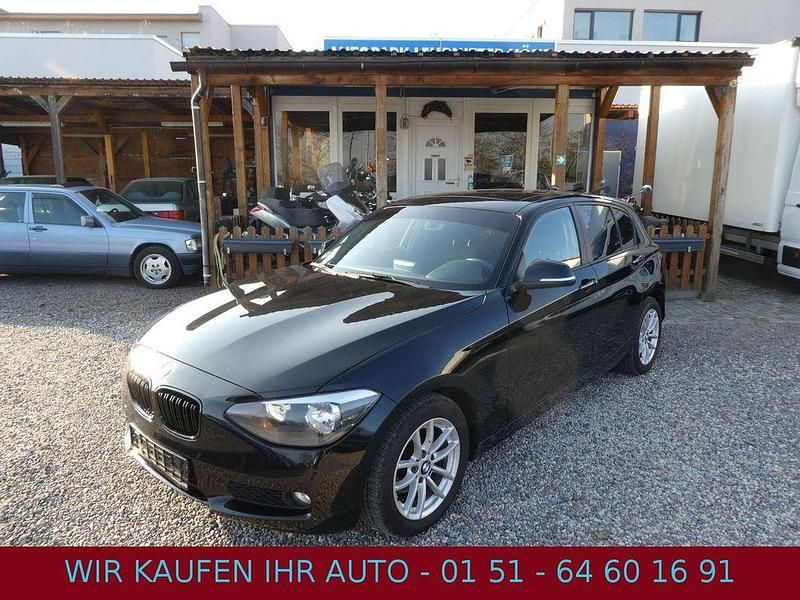 Schwarz Gebraucht 2012 BMW 116 Sport Line Kleinwagen | 7.490 € (Fairer Preis) - Bild 1/4