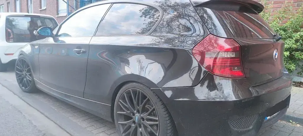 Gebraucht BMW 116 122 PS (89 kW) 2008 Schwarz Kleinwagen