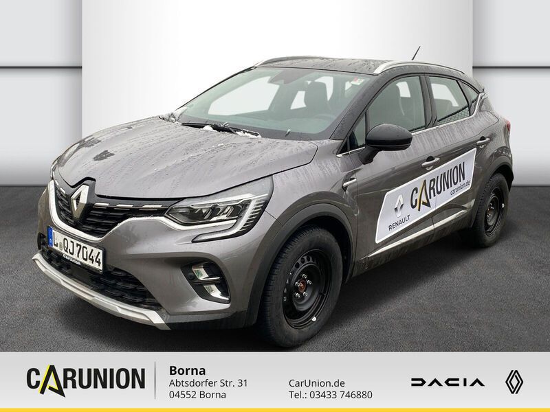 Stahlgrau metallic, black pea Gebraucht 2022 Renault Captur Intens SUV | 19.495 € (Fairer Preis) - Bild 1/4