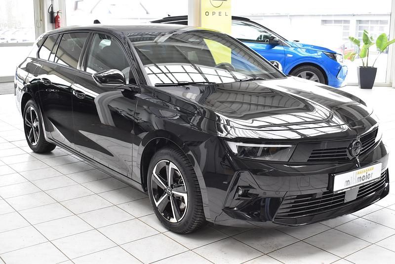 Gebraucht Opel Astra 131 PS (96 kW) 2024 Schwarz karbon schwarz met. Kombi