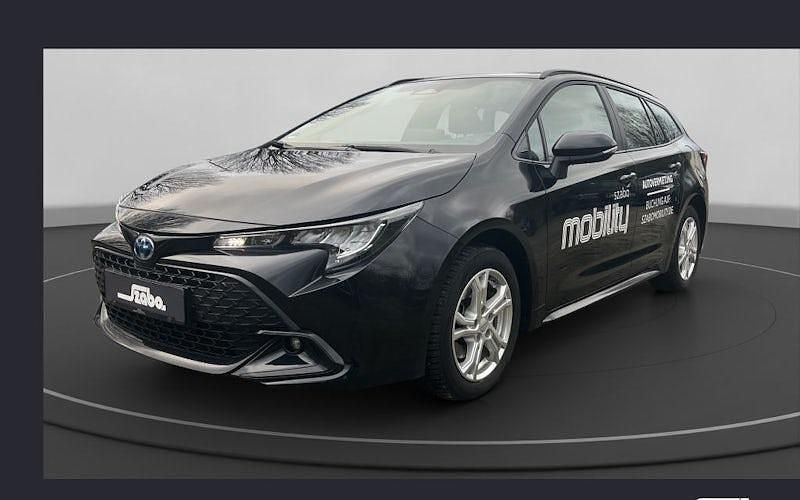 Mysticschwarz mica Gebraucht 2024 Toyota Corolla Business Edition Kombi | 28.550 € (Fairer Preis) - Bild 1/4
