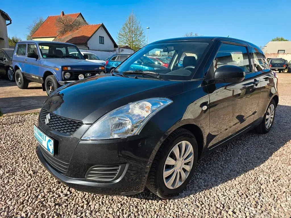 Second-hand Suzuki Swift 94 CP (69 kW) 2013 Negru Hatchback
